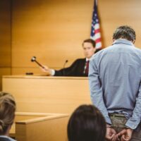 A male in court being sentenced.